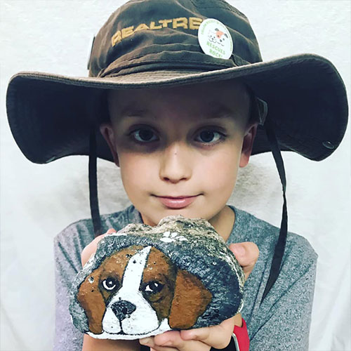 Storia d'amore di un bambino e del suo cane Rocksy, oltre la malattia