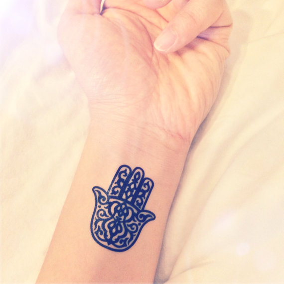 Cerchi un'Idea per un Tatuaggio sul Polso? Lasciati Ispirare da Queste 35 Foto!