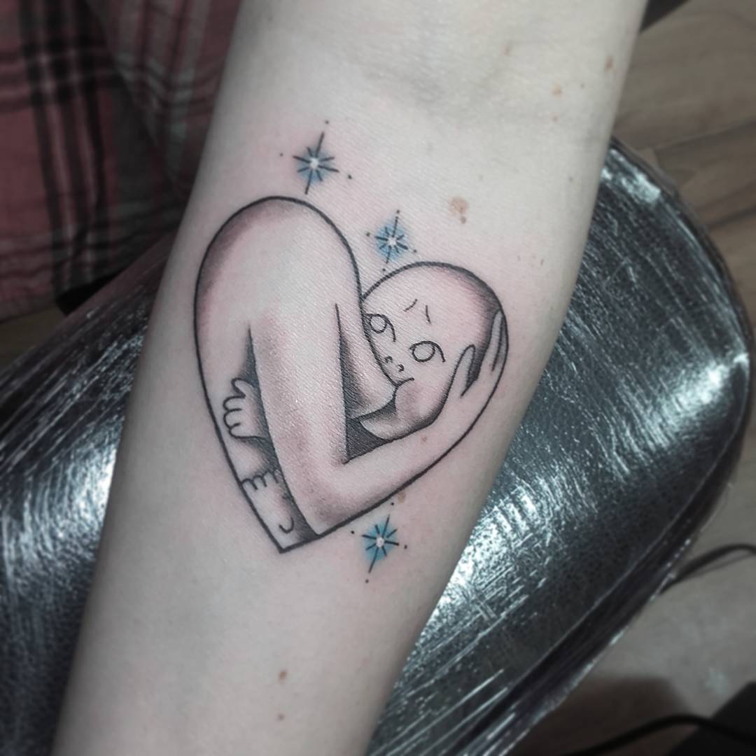 10 tatuaggi per celebrare la bellezza dell'allattamento al seno