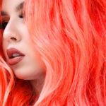 Neon peach hair, la tendenza dell'estate: a chi sta bene e 10 idee da copiare